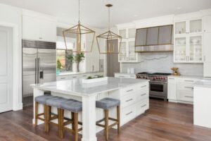 Kitchen with Island and modern appliances, white and silver colors
